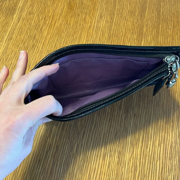 Black Coach clutch with zipper and one inside pocket. - Picture 7 of 9